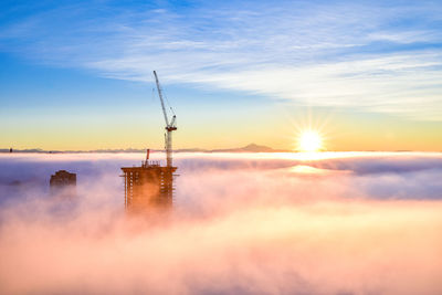 Scenic view of above the cloud during sunset