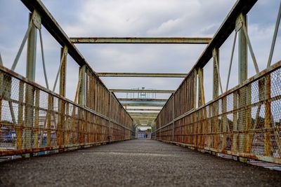 Surface level of bridge against sky