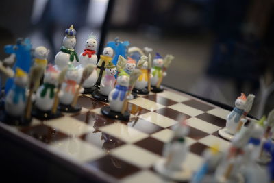 Close-up of chess pieces on table