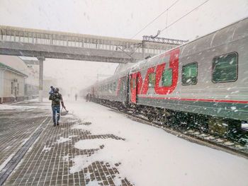 Train on railroad tracks during winter