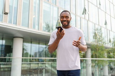 Young man using mobile phone