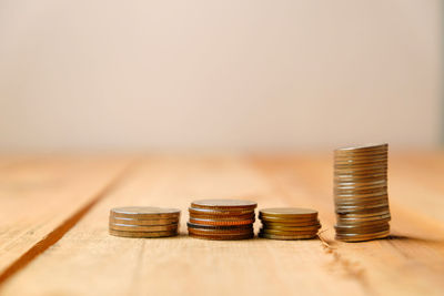 Close-up of coins on table