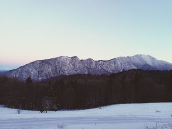 Scenic view of mountains against clear sky