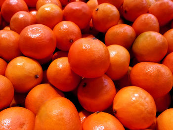 Full frame shot of oranges at market stall