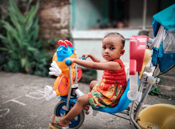 Baby girl with bicycle