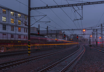 Railroad tracks at night