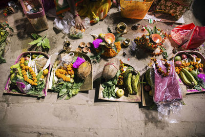 High angle view of religious offerings in market