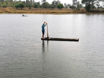 Man standing in lake