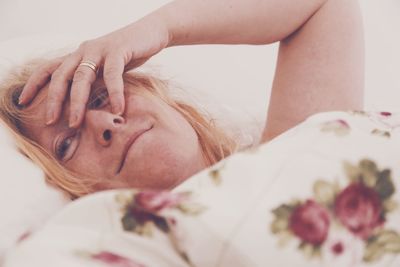 Close-up of woman in bed