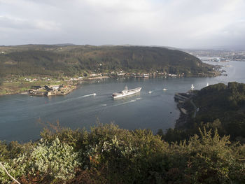 High angle view of sailboats and sea against sky