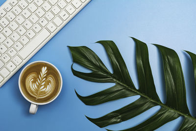 High angle view of coffee cup on table