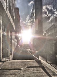 Sun shining over city