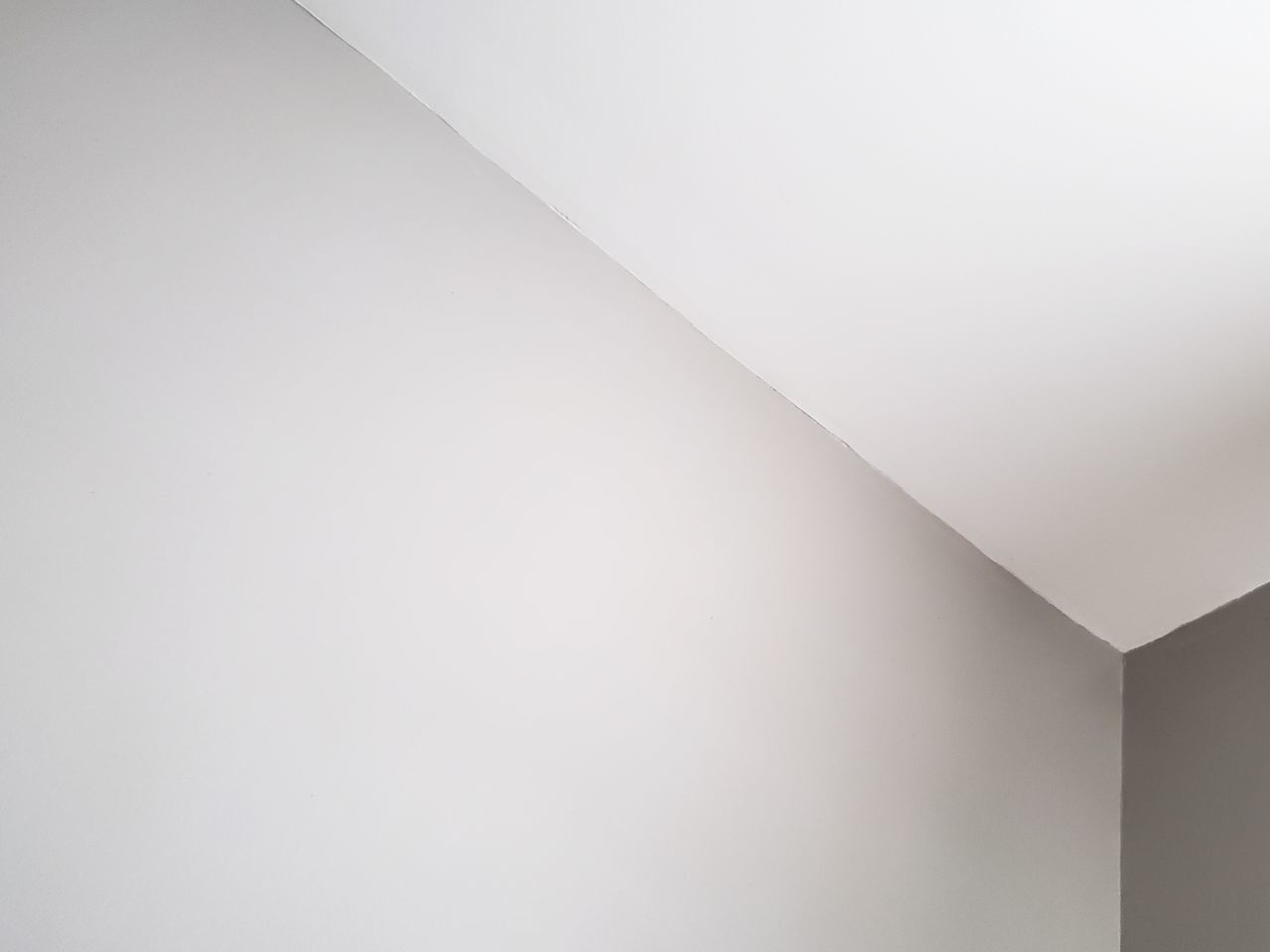 LOW ANGLE VIEW OF CEILING AND BUILDING