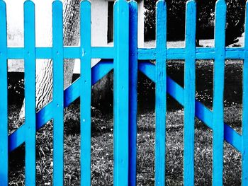 View of railing against blue sky