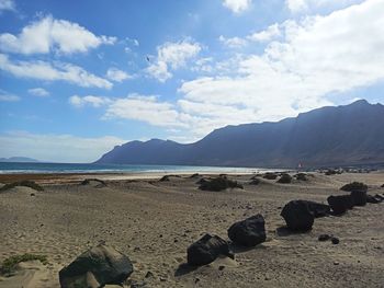 Scenic view of beach against sky