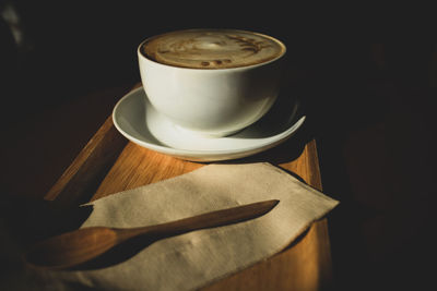 High angle view of coffee cup on table