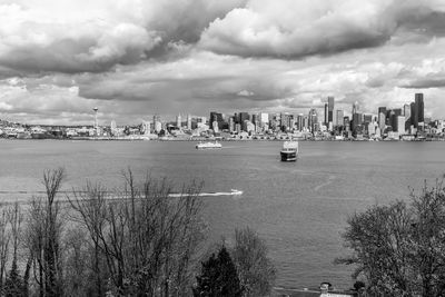 A view of the seattle skyline with clouds above.