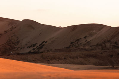 Scenic view of desert against sky