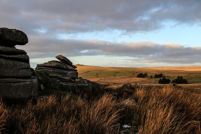 Scenic view of rocks against sky