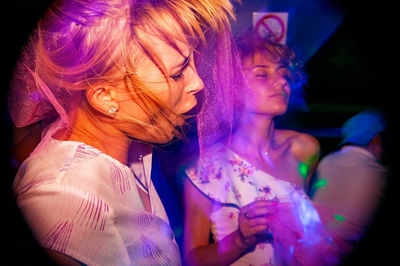 Crazy women dancing at night club