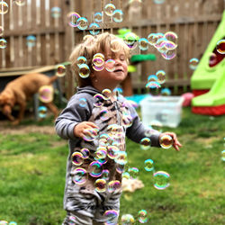 Full length of woman with bubbles