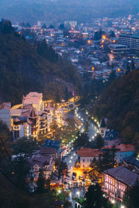 High angle view of illuminated cityscape at night