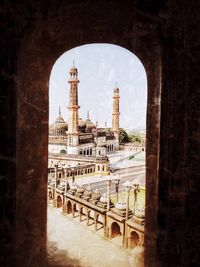 View of historic building seen through arch