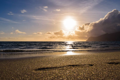 View of beach at sunset