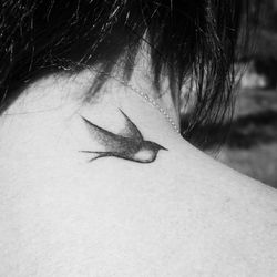 Close-up of person sleeping on leaf