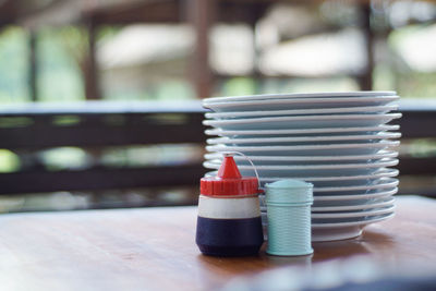 Close-up of containers on table