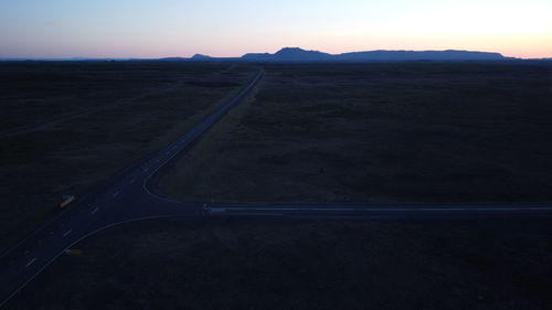 Scenic view of road against sky during sunset