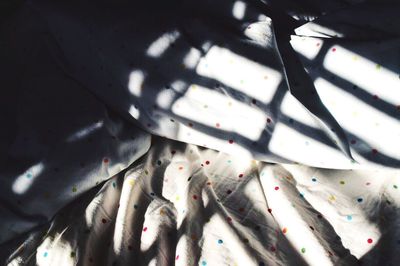 High angle view of sunlight on floor