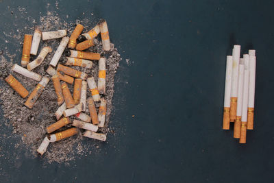 High angle view of cigarette smoking on street