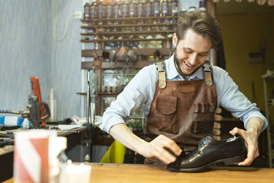 Young man working at table