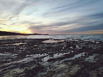 Scenic view of sea against sky during sunset