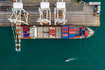 Aerial view of illuminated ship at harbor