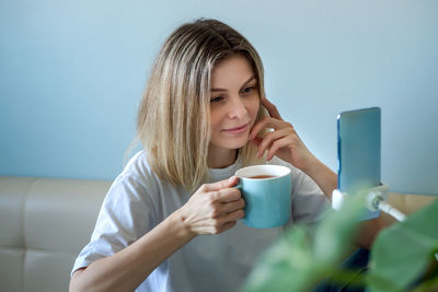 Young woman using mobile phone