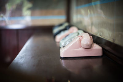 High angle view of telephones on table