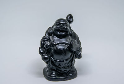 Close-up of sculpture against white background