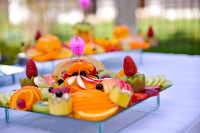 Close-up of multi colored fruits in plate