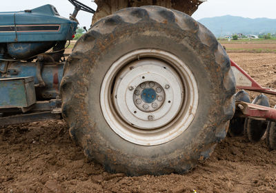 View of abandoned truck on field