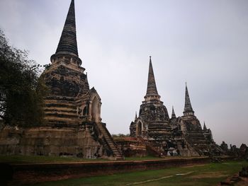 Old temple building against sky