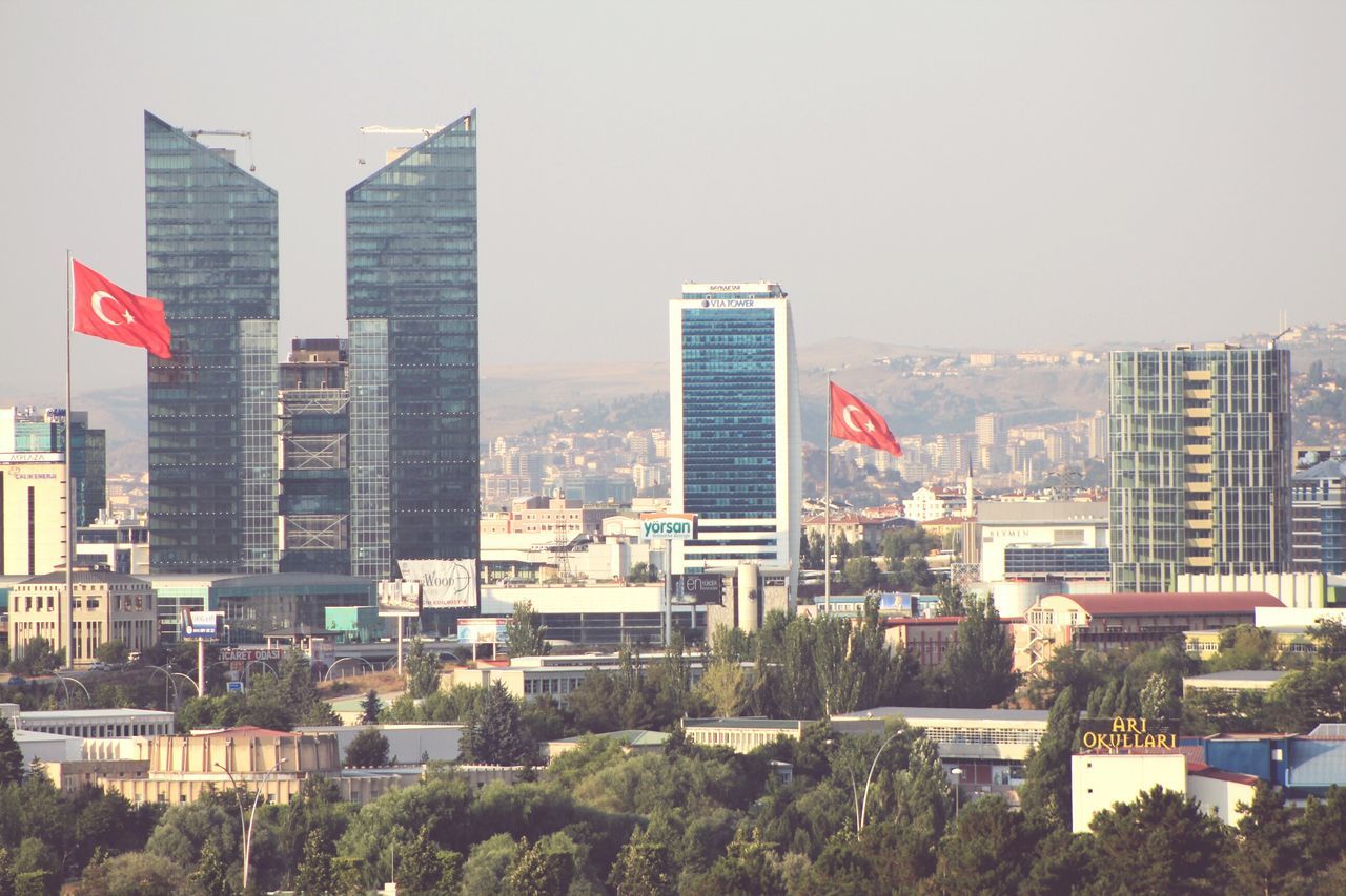 building exterior, architecture, built structure, city, skyscraper, cityscape, tower, tall - high, clear sky, modern, office building, building, residential building, residential district, crowded, development, residential structure, city life, sky, tall