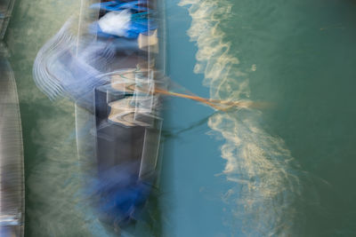 Reflection of woman in water