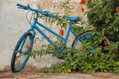 Bicycle parked on sand