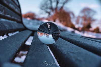 Close-up of crystal ball on snow