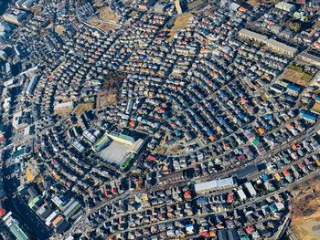 High angle view of street amidst buildings in city