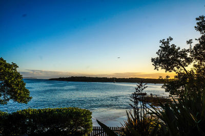 Scenic view of sea against clear sky