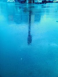 Reflection of blue sky in water