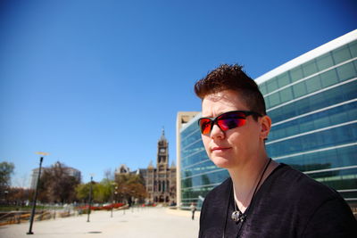 Portrait of young man looking away